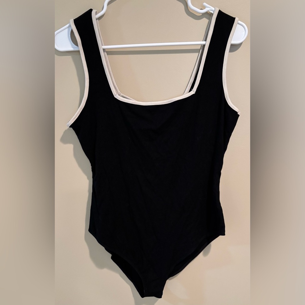 Black Sleeveless bodysuit with White Trim